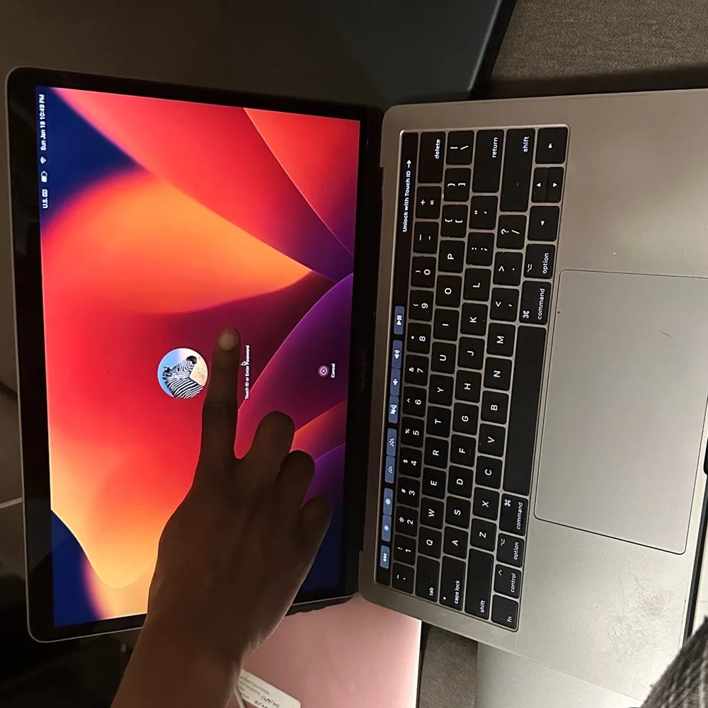 Apple MacBook with Black and Silver Design